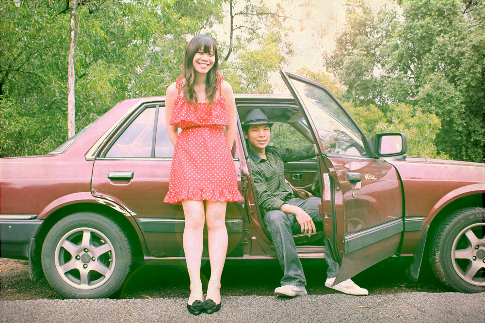 Engagement shoot with a vintage red car at Canterbury road