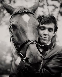 French groom with horse