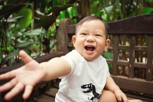 laughing one year old baby boy botanic garden photoshoot