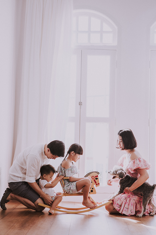 Family of four with pet dog photography family photoshoot in oh dear studio 