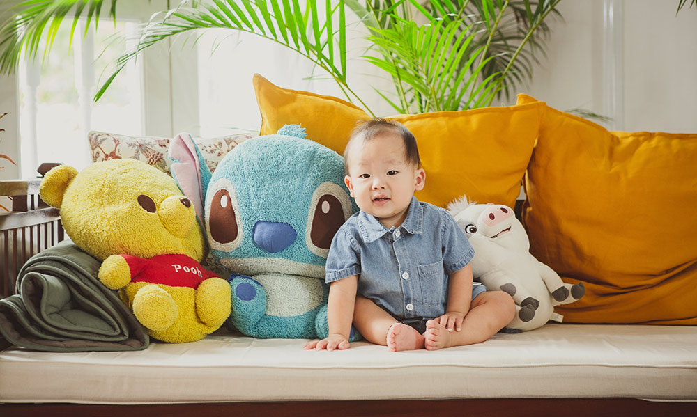 Baby with favourite plushies