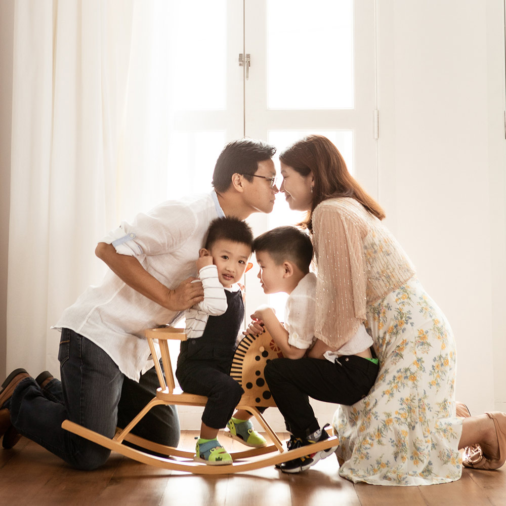 Natural light window shoot of family of four