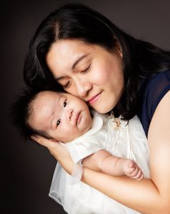 Mother and two months old baby fine art studio portrait