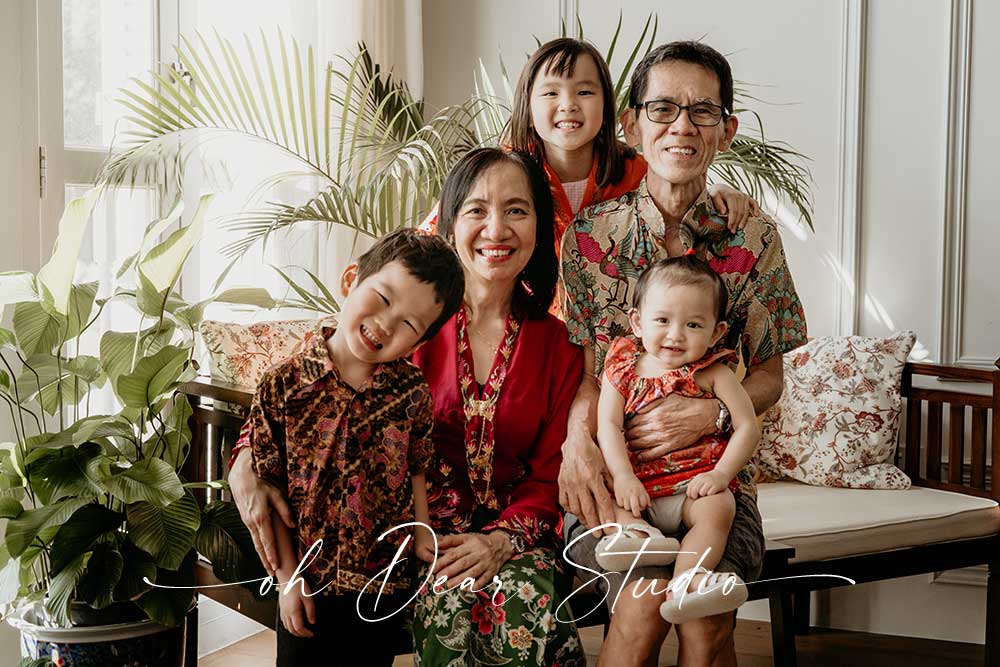 Grandparents and grandkids in Peranakans Kebaya batik