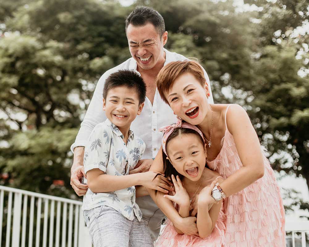 Family photoshoot with greenery on Oh Dear Studio rooftop