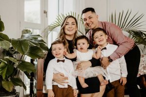 expat family of five baby smiling