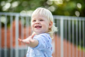 toddler playing bubbles photo