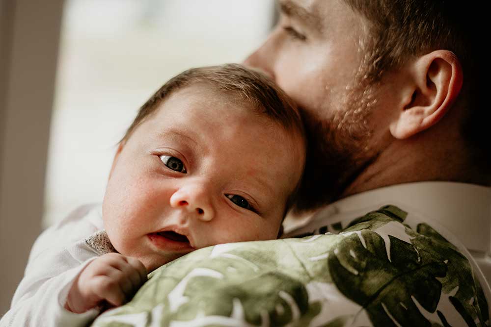 father and 6 weeks old baby