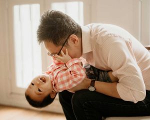 laughing professional baby photography studio