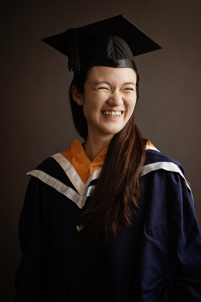 laughing NUS graduation lady