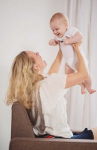 mama playing with baby photoshoot studio idea