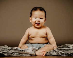 sitting seven months old baby photoshoot studio