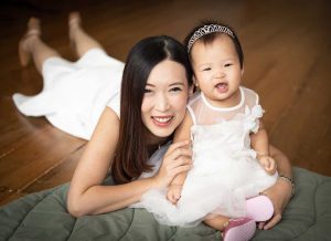 mother and laughing one year old baby girl in Natural Light Oh Dear Studio Singapore