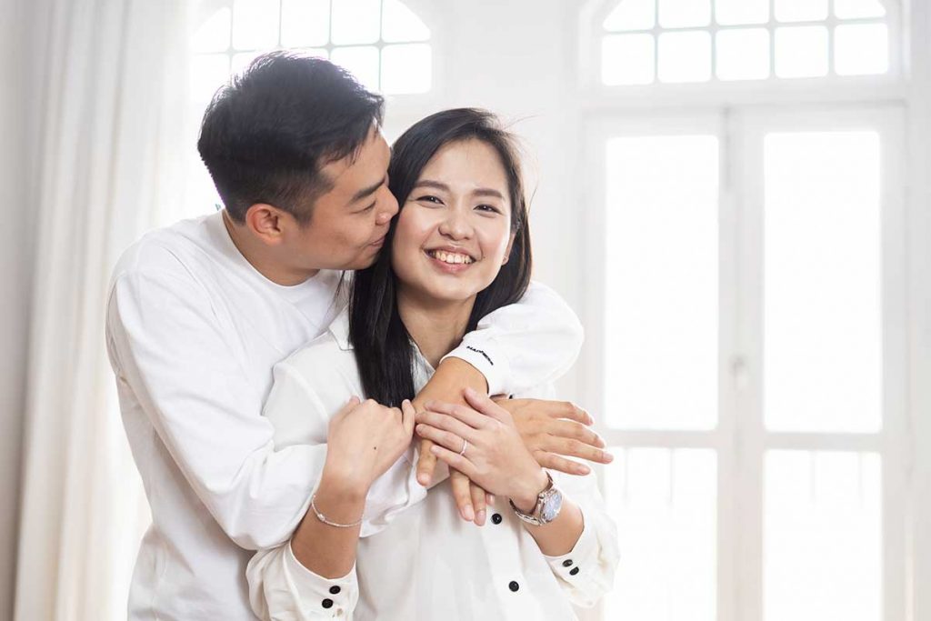 A couple having an indoor photoshoot