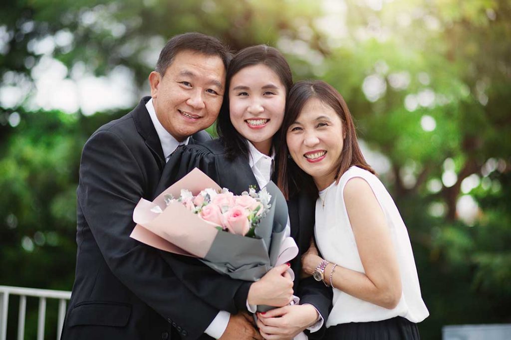 legal lawyer graduation family photo greenery natural light singapore