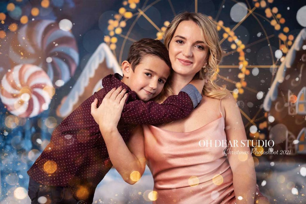 mother and smiling son Christmas photography studio 2021