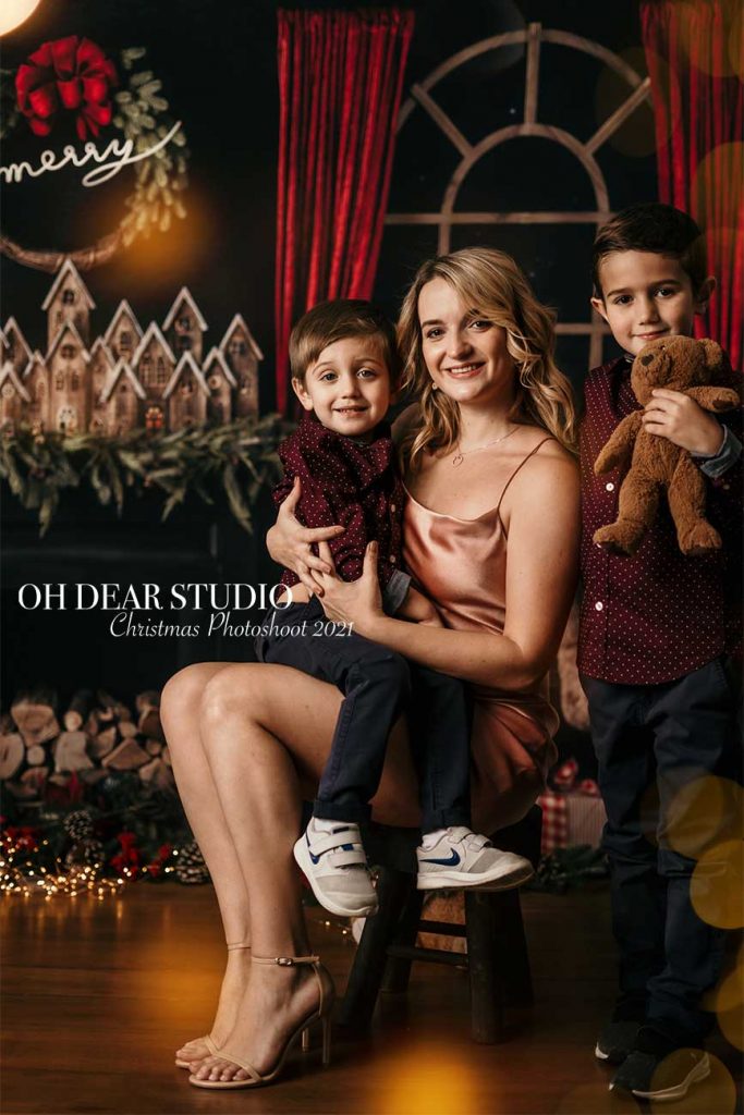 mother with two sons Christmas xmas photoshoot studio