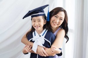 smiling mother and k2 little girl white curtain OH DEAR STUDIO