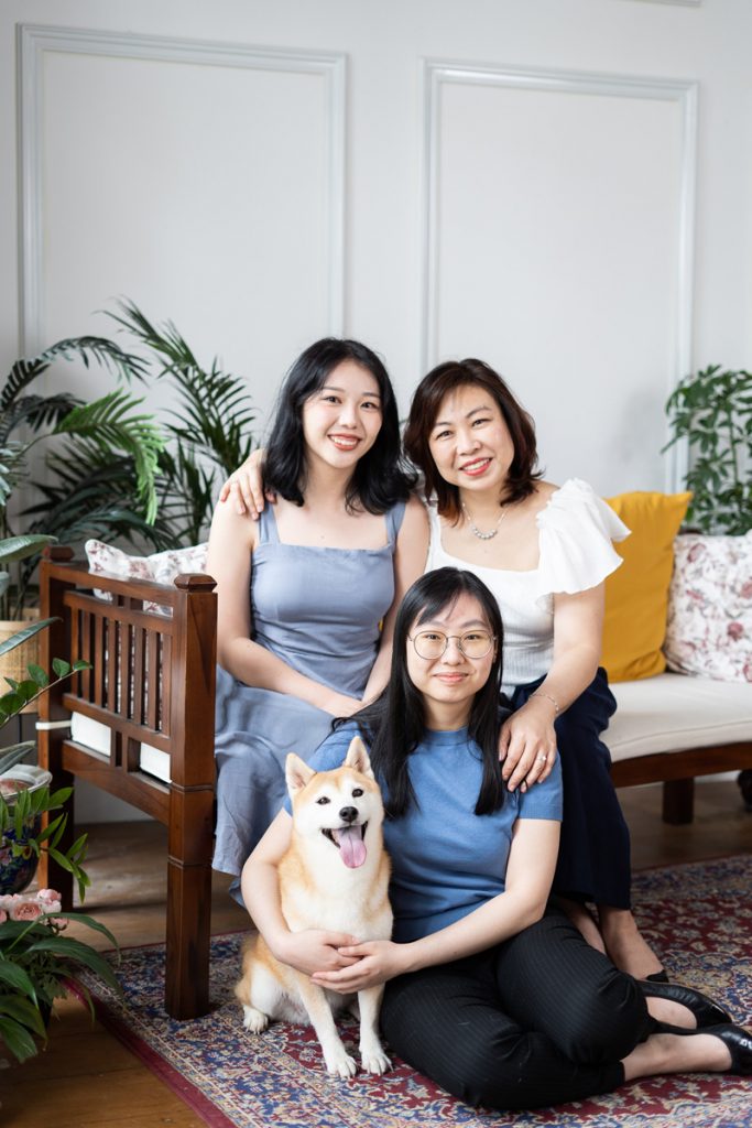 daughters and mother with pet Shiba dog photo