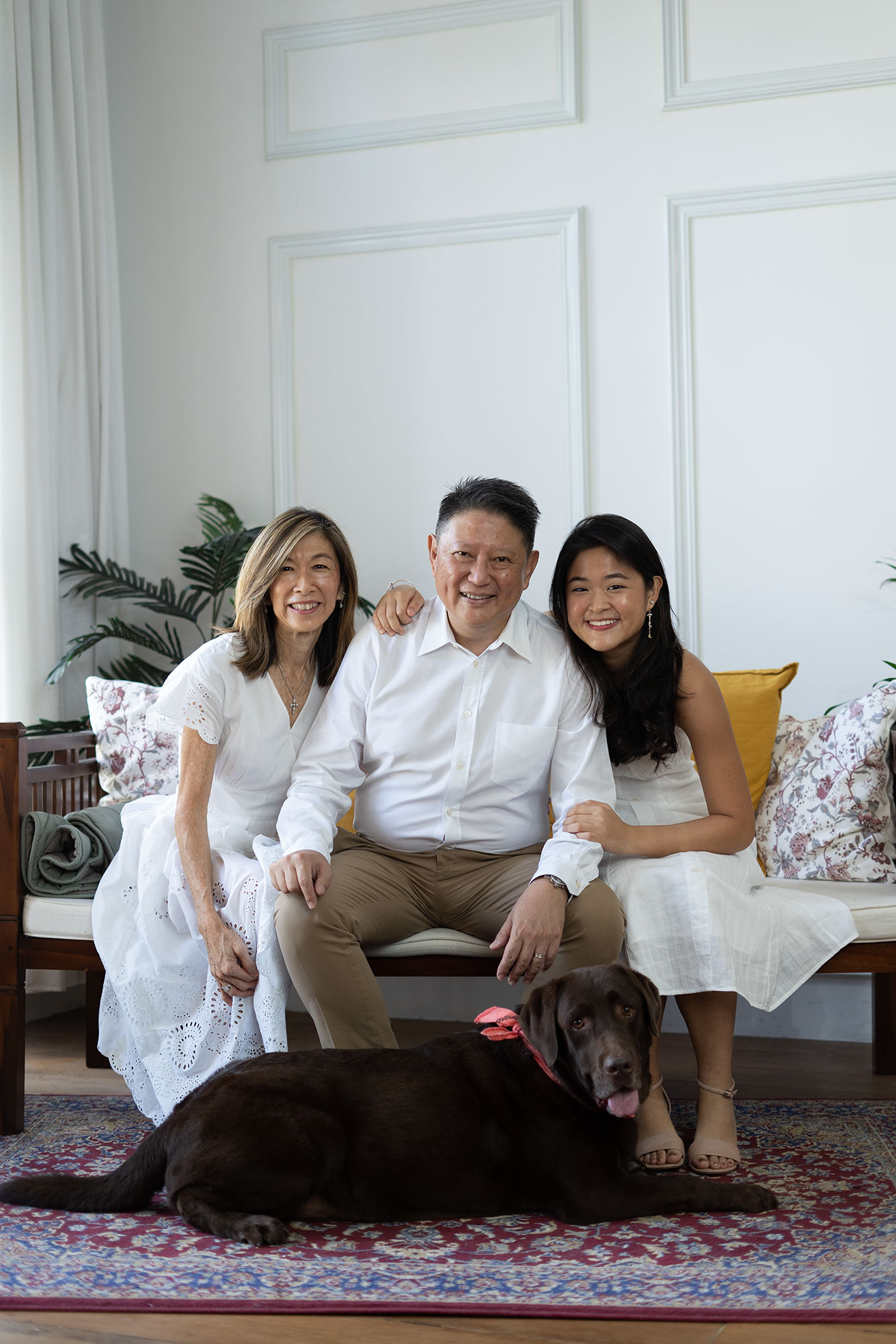 Adult family photoshoot natural light studio with pet dog 3pax camera raw