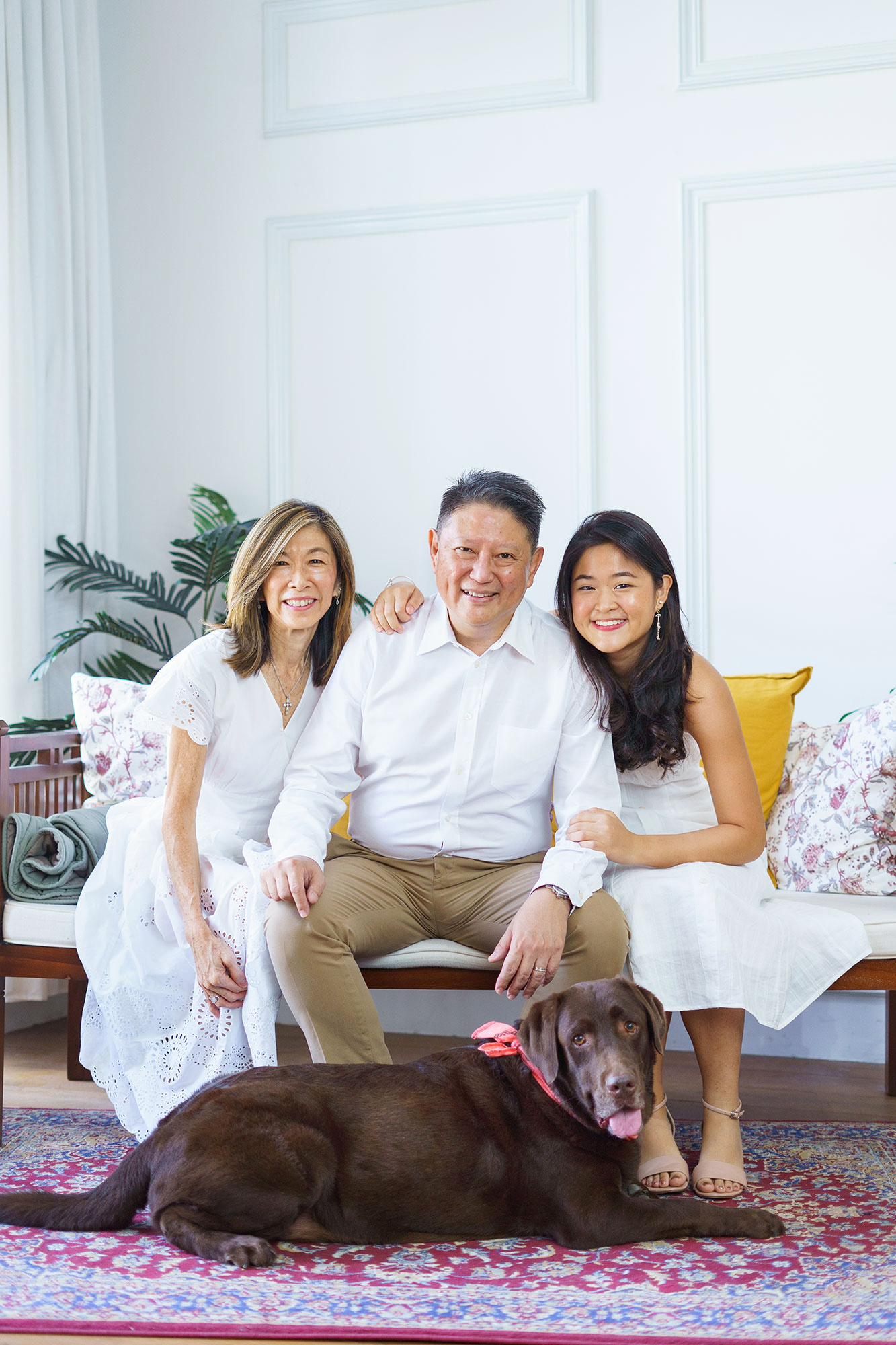 Adult family photoshoot natural light studio with pet dog 3pax