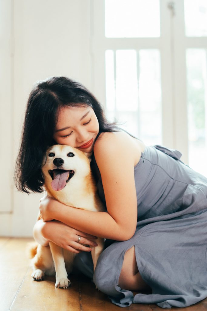 lady hugging smiling pet Shiba dog photography