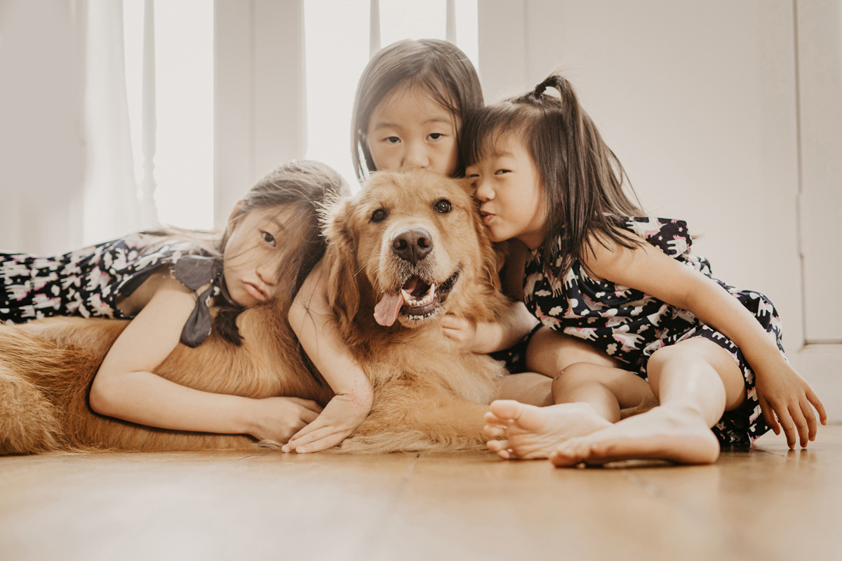 sisters with pet dog photoshoot