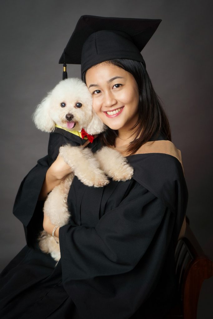 graduation photoshoot with pet dog smiling photo studio