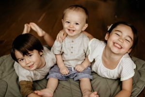 one year old baby photoshoot with toddler siblings