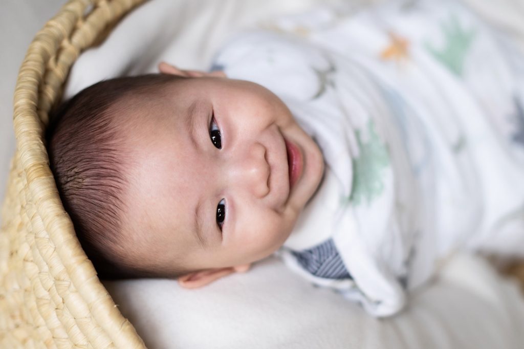 smiling 100 day old baby happy photo