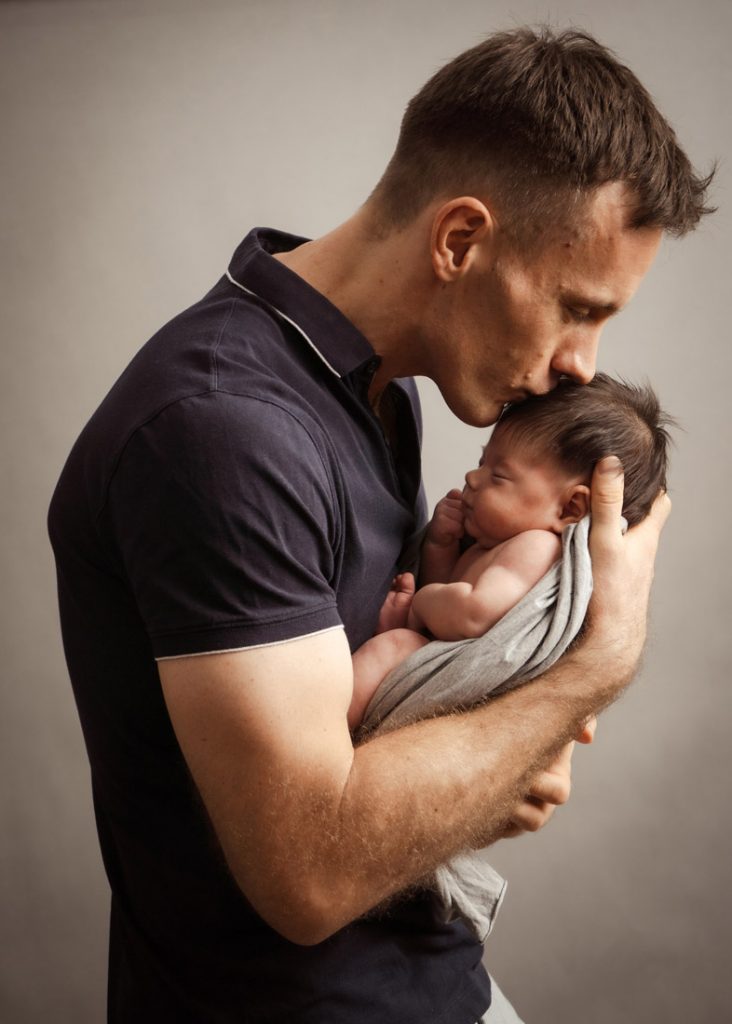studio father and newborn infant baby photoshoot studio
