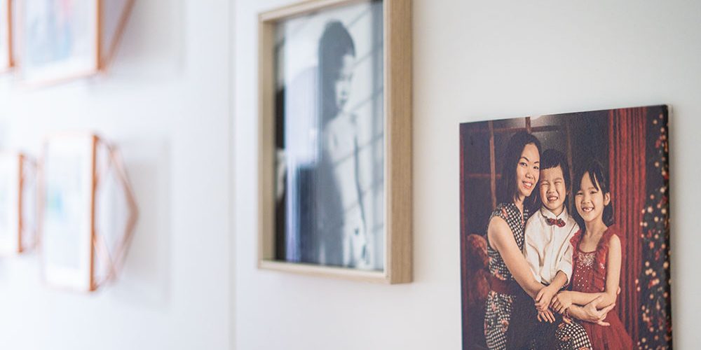 printed-canvas-in-hallway Printed canvas of family portrait in hallway