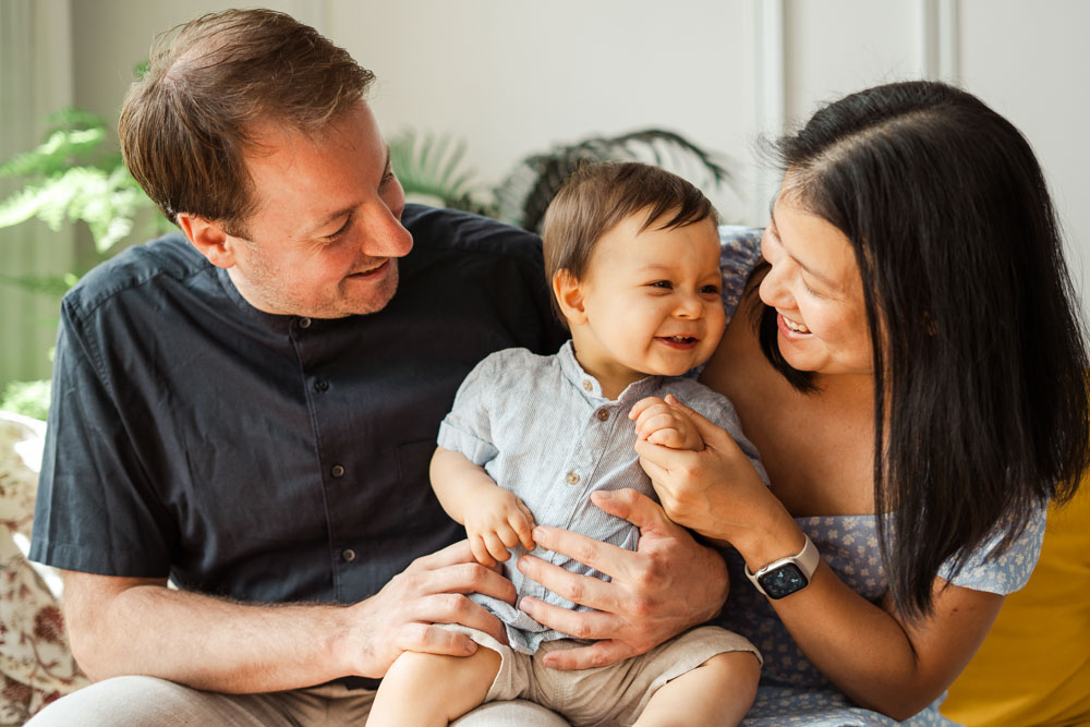 young candid family one year old baby