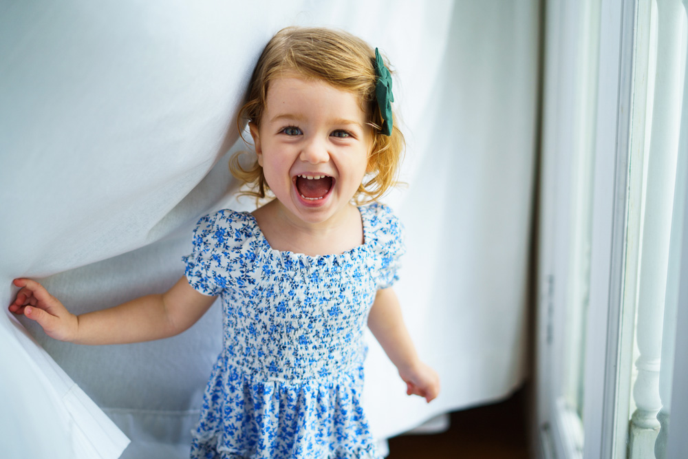 happy little toddler girl laughing