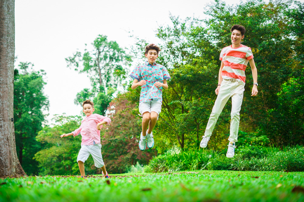 candid 3 brothers sibling portrait photography jumping