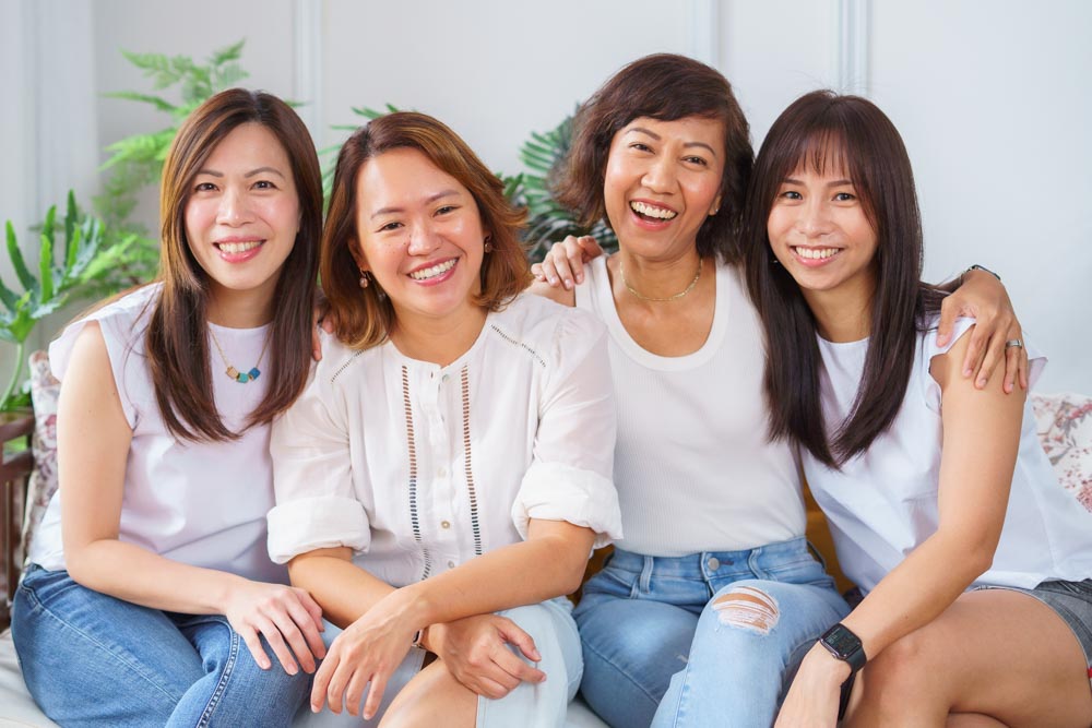 4 ladies smiling candid chit chat in Oh Dear Studio