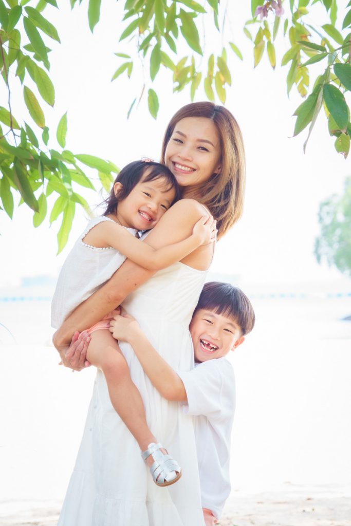 mother and children portrait on sentosa tanjong beach