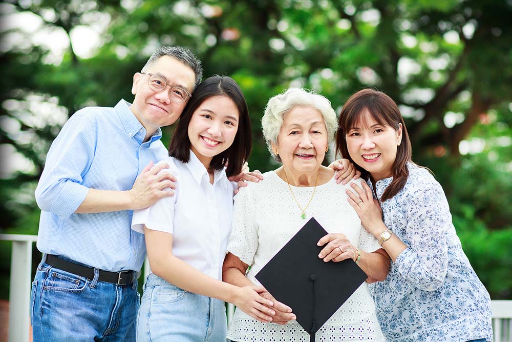 3 generation graduation family photo