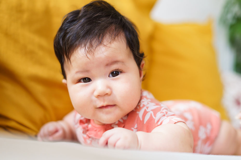 100 day old baby tummy time photography