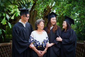 photoshoot with wheelchair grandmother three graduate graduation