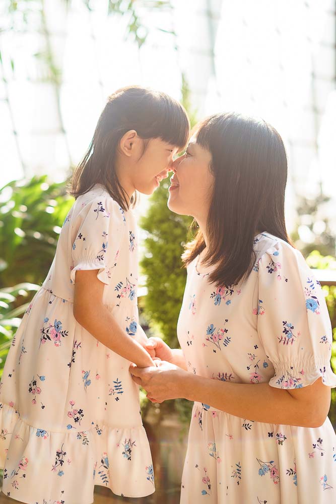 Mother and daughter in magical sunlight