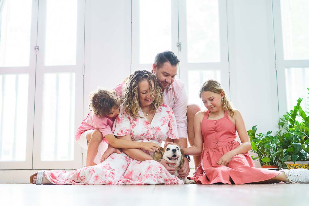 family of four and pet dog