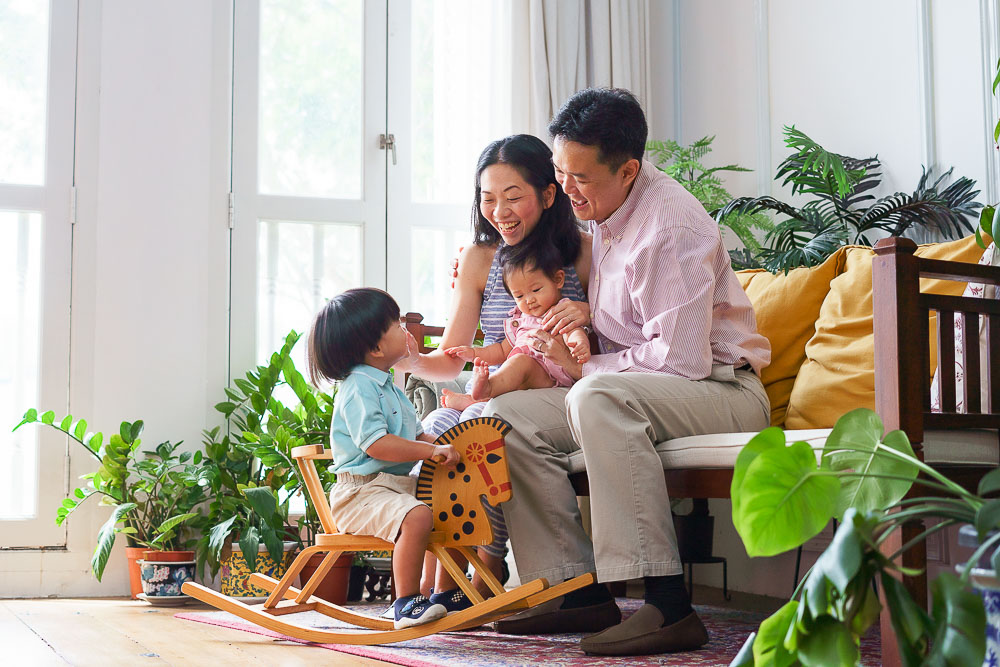 candid parents and toddler baby photoshoot