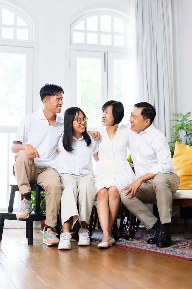 4 pax military family candid laughing