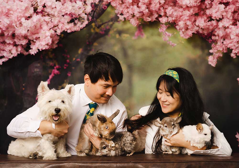 couple pet photography studio dog rabbit and chinchilla