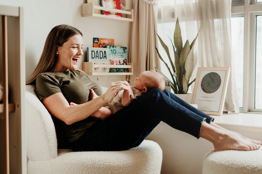 mother and infant baby relaxing at home
