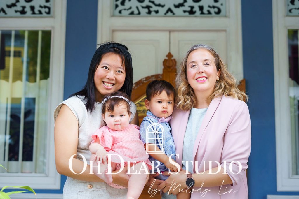 LGBTQ+ family photoshoot outdoor two mothers