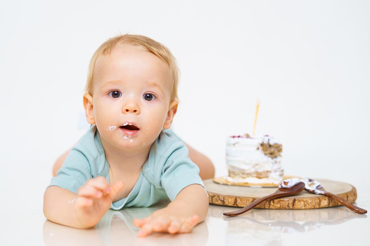 Pre-birthday Studio photoshoot baby in white clean simple studio backdrop