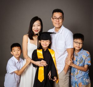 family celebrating k2 graduation photoshoot studio singapore