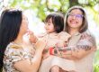 Autism friendly family photographer in Singapore capturing a candid moment with an LGBTQ+ family at a hotel session